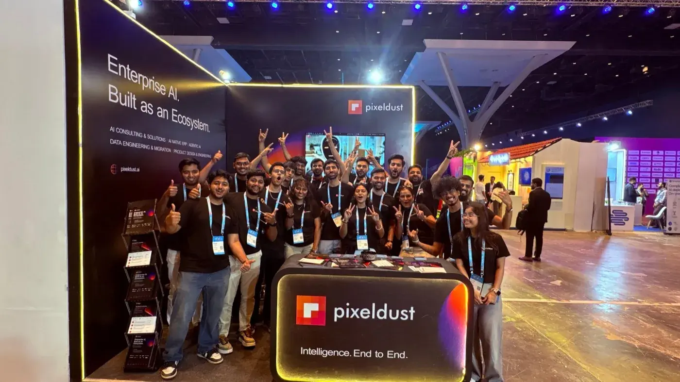 Team celebrating at the booth